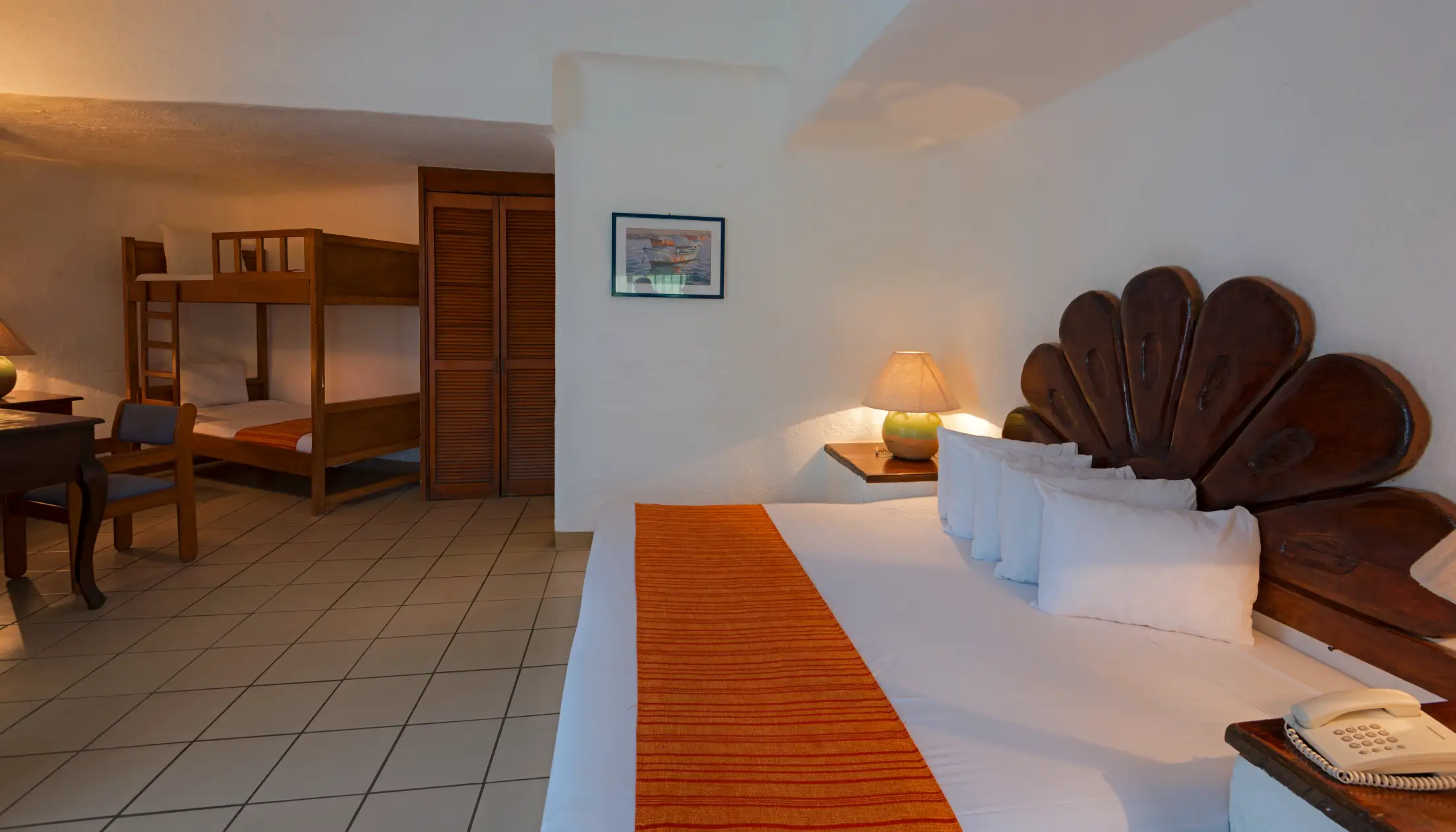 Family room with king bed and bunk beds